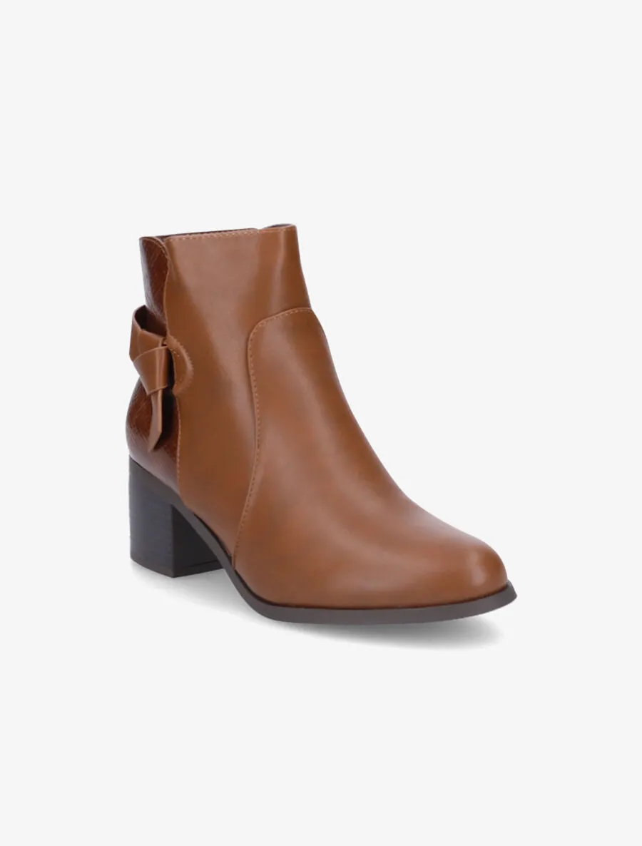 Bottines bi-matière à boucle