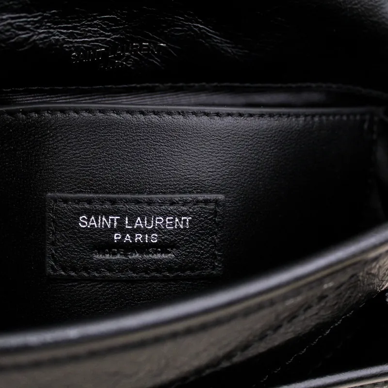 Sac Niki Baby en cuir vintage froissé noir – Saint Laurent